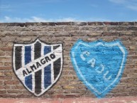 Mural - Graffiti - Pintadas - "Amistad con CADU" Mural de la Barra: La Banda Tricolor • Club: Almagro • País: Argentina