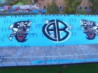 Mural - Graffiti - Pintada - "Ideada y proyectada por el Loco Tito, la 1a tribuna muralizada de Argentina" Mural de la Barra: Los Piratas Celestes de Alberdi • Club: Belgrano