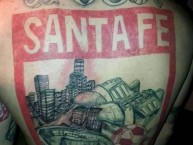 Tattoo - Tatuaje - tatuagem - "Bosa es del léon. Aguante la Zona Seotima." Tatuaje de la Barra: La Guardia Albi Roja Sur • Club: Independiente Santa Fe