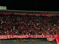 Foto: Barra: Disturbio Rojo Bogotá • Club: América de Cáli