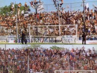 Foto: "contra comu, diciembre 2004, el Depo copo su tribuna local y la visitante tambien" Barra: La Banda del Parque &bull; Club: Deportivo Merlo
