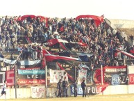 Foto: "Hinchada de BROWN vs. Sp. Italiano, Cancha de Estudiantes (Bs.As.), Junio 2002" Barra: Los Pibes del Barrio • Club: Brown de Adrogué • País: Argentina