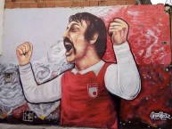 Mural - Graffiti - Pintada - "Mural Homenaje a Pandolfi: Idolo de la estrella de 1975" Mural de la Barra: La Guardia Albi Roja Sur • Club: Independiente Santa Fe