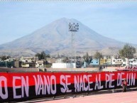 Trapo - Bandeira - Faixa - Telón - "No en vano se nace al pie de un volcán" Trapo de la Barra: León del Svr • Club: Melgar • País: Peru